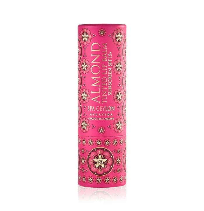 Almond tinted lip balm by Spa Ceylon with Ayurvedic ingredients and floral design.