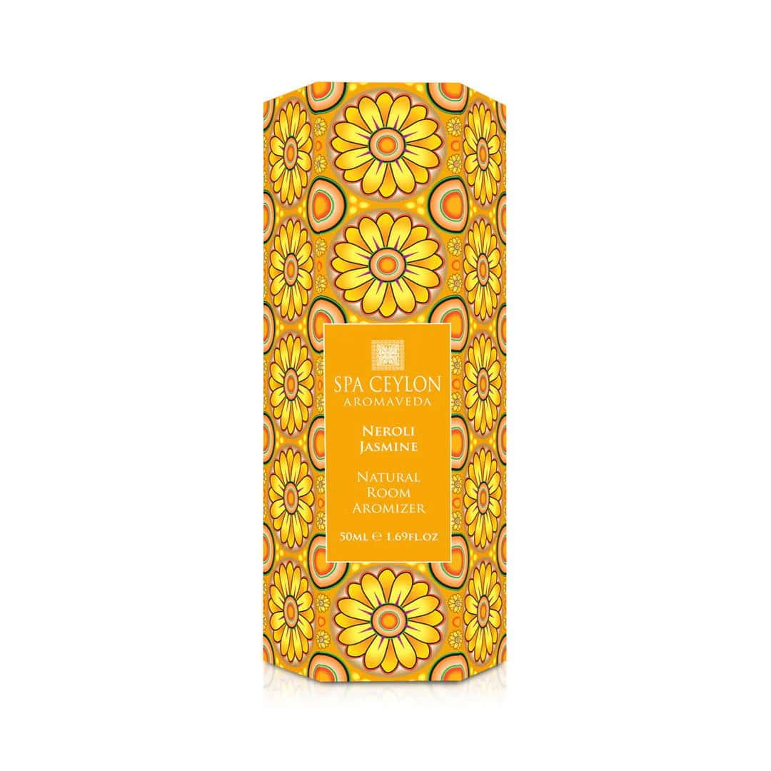 Vibrant yellow floral patterned Spa Ceylon room aromatic spray bottle.