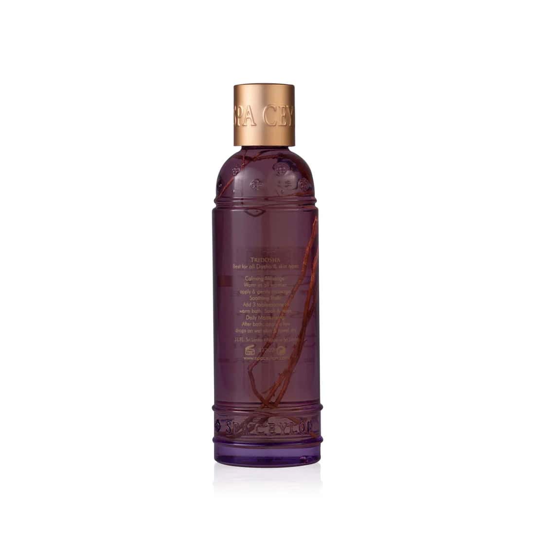 Violet Spa Ceylon Ayurveda hair and body mist bottle with gold cap.