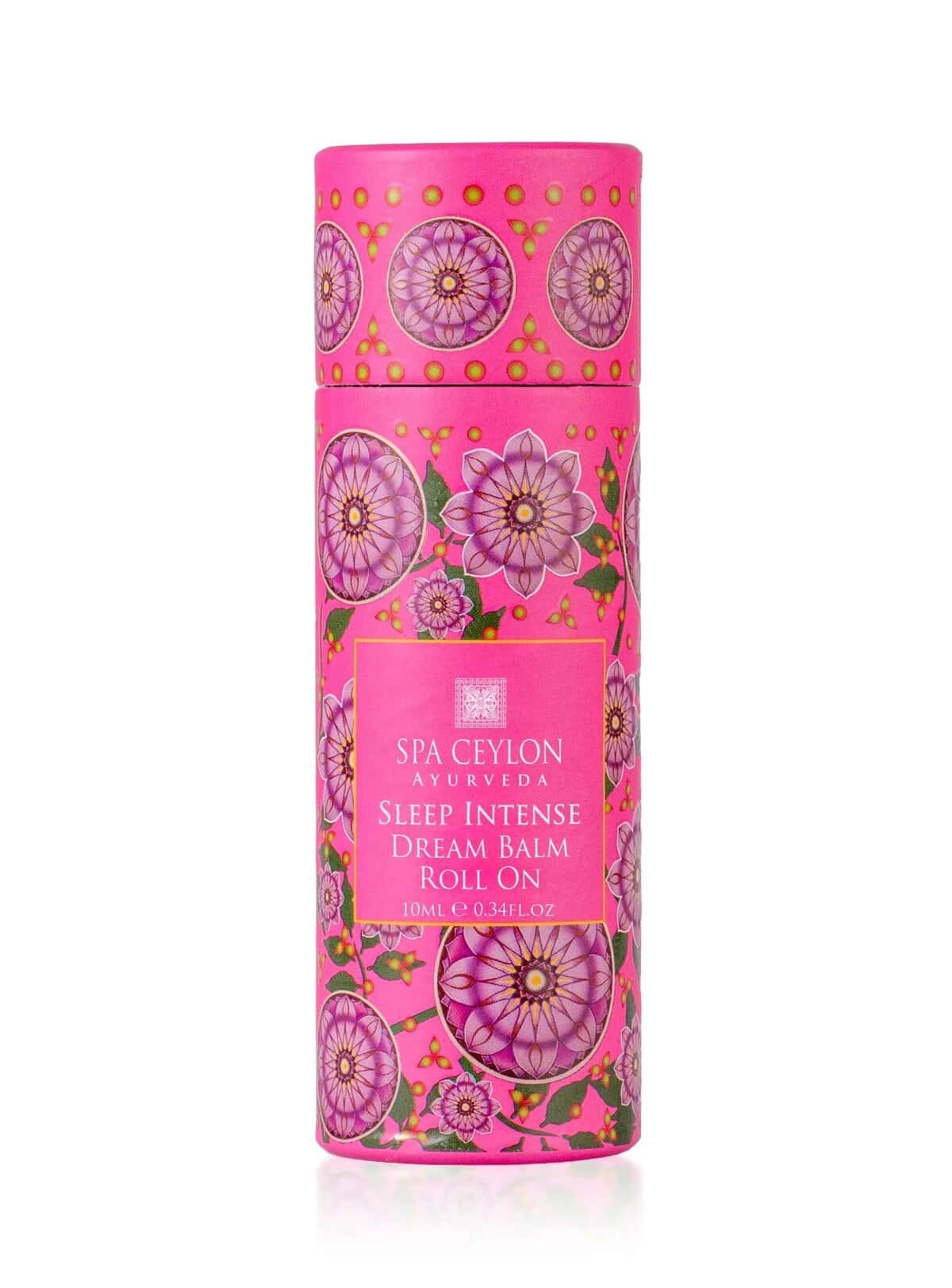 Vibrant pink Spa Ceylon Sleep Intense Dream Balm Roll On with floral design and gold accents.