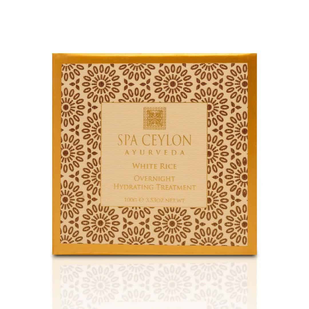 Luxurious Spa Ceylon Ayurveda White Rice Overnight Hydrating Treatment packaging, natural herbal skincare product, vibrant orange and gold design.
