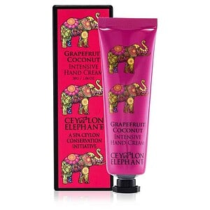 Vibrant pink hand cream tube with colorful elephant design for luxurious skin care.