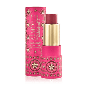 Almond Sunshine SPF Lip Balm by Spa Ceylon in vibrant pink packaging.