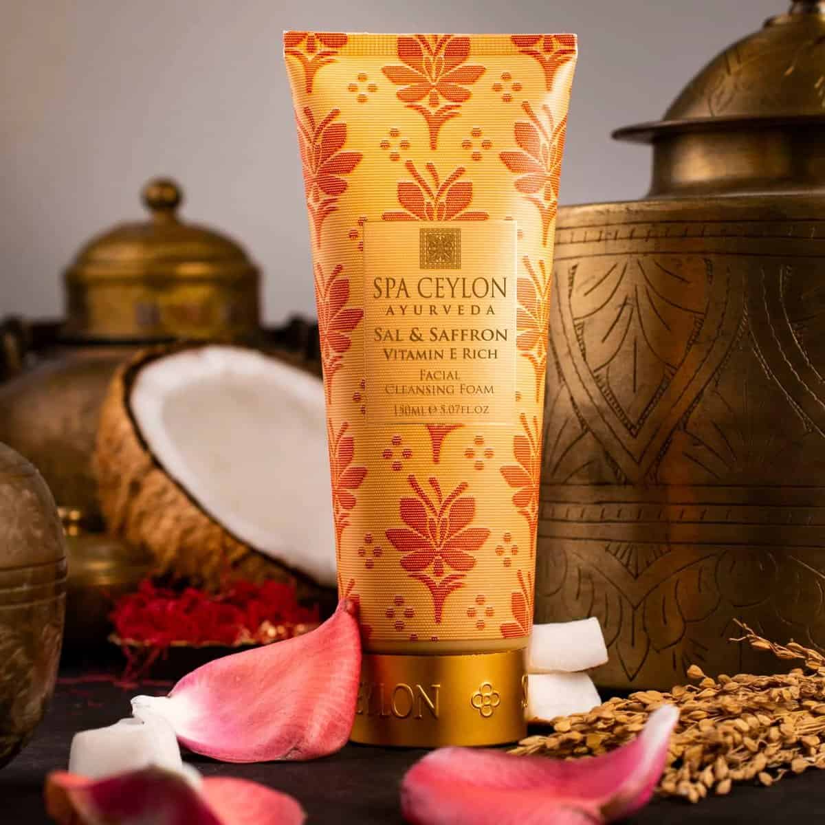 Luxurious Spa Ceylon Ayurveda facial cleansing foam with salt, saffron, and vitamin E, surrounded by traditional Indian decor.