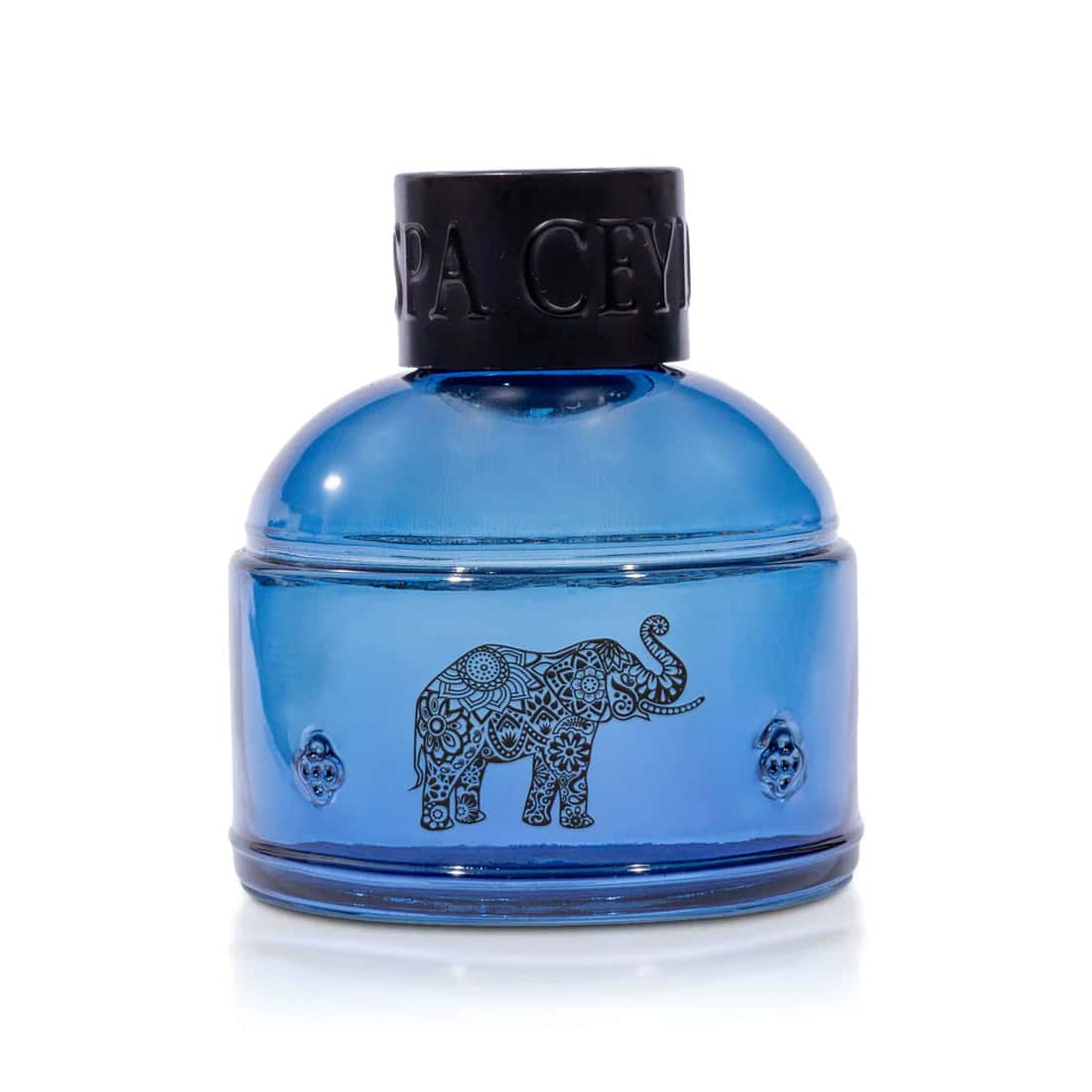 Vibrant blue Spa Ceylon essential oil jar with intricate elephant design.